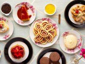 variety of baked and dessert foods on plates