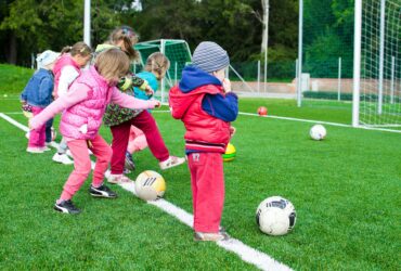 toddler playing soccer