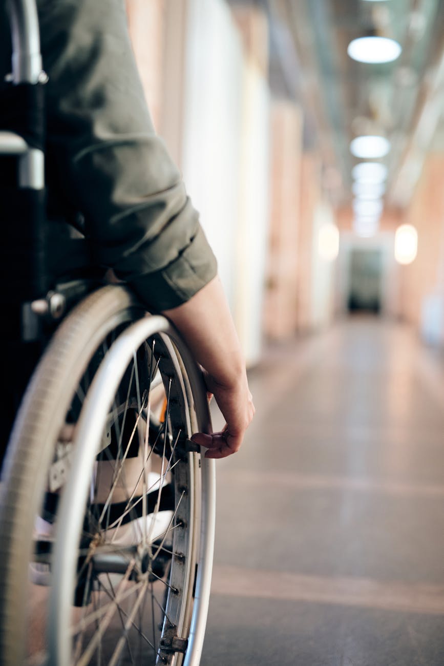 person sitting on wheelchair