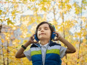 photo of a boy listening in headphones